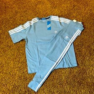 powder blue adidas top and bottom set